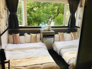 Postelja oz. postelje v sobi nastanitve Vve Vve Hotel