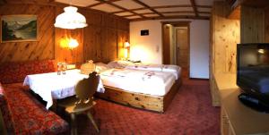 En eller flere senger på et rom på Hotel-Gasthof "Zur Mühle"