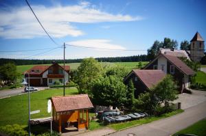 an overhead view of a village with houses and a street at Black Forest Lodge in Freudenstadt
