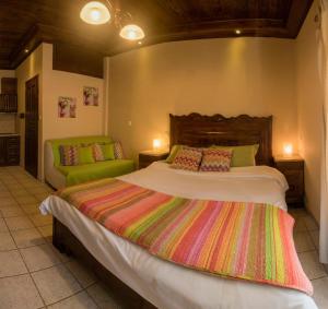 Postel nebo postele na pokoji v ubytování Guesthouse Theodorou