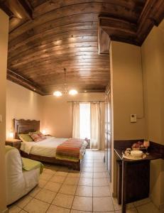 Postel nebo postele na pokoji v ubytování Guesthouse Theodorou