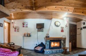 TV a/nebo společenská místnost v ubytování Guesthouse Theodorou