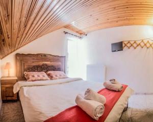 Postel nebo postele na pokoji v ubytování Guesthouse Theodorou