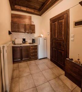 Kuchyň nebo kuchyňský kout v ubytování Guesthouse Theodorou