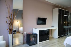 TV a/nebo společenská místnost v ubytování Hotel Relax