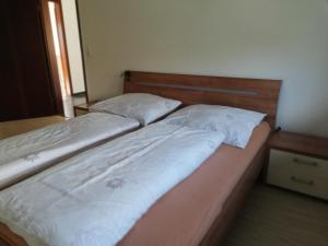 Postel nebo postele na pokoji v ubytování Modernes 2-Zimmer-Apartment nahe Graz