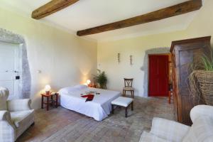 Ліжко або ліжка в номері Chateau de Montfroc