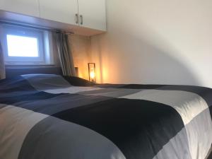 Postel nebo postele na pokoji v ubytování Het Kleinste Hof
