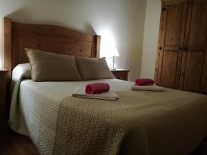 Postel nebo postele na pokoji v ubytování Casa Rural Mirador del Valle