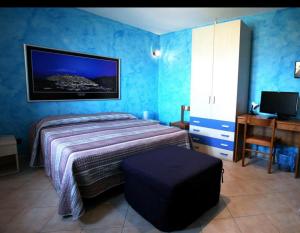 Posteľ alebo postele v izbe v ubytovaní B&B IL GALLETTO R.