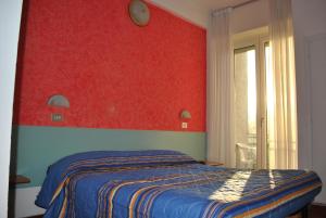 Posteľ alebo postele v izbe v ubytovaní Hotel Senior