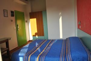 Posteľ alebo postele v izbe v ubytovaní Hotel Senior
