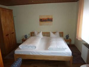 Postel nebo postele na pokoji v ubytování Gasthaus Gonnermann