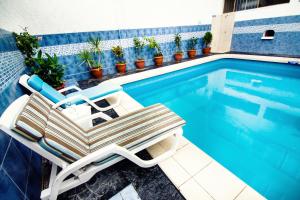 The swimming pool at or close to Hotel El Sol