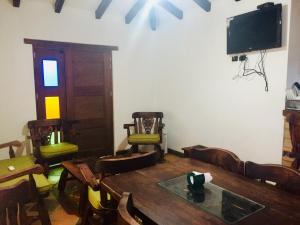 TV a/nebo společenská místnost v ubytování Cabañas Duna Campestre