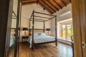 Postel nebo postele na pokoji v ubytování Niketh Villa Kandy