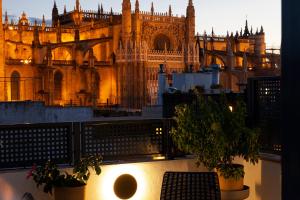 a view of the london skyline from a balcony with a building at Welldone Cathedral in Seville