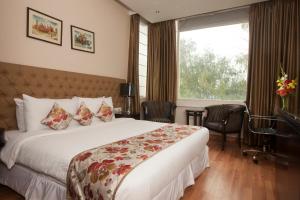 Cama o camas de una habitación en Hotel Athena