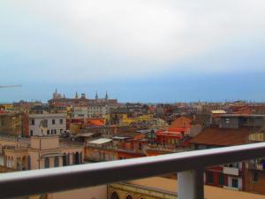 a view of a city from a balcony at Buonarroti Guest House in Rome