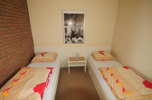 מיטה או מיטות בחדר ב-Apartment " Welwerwoltz "