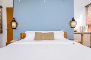 Кровать или кровати в номере Krabi Home Resort