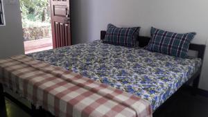 Postel nebo postele na pokoji v ubytování Chill Inn Guest House