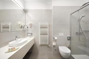 Koupelna v ubytování Hotel Salona Palace