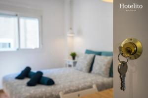 Postel nebo postele na pokoji v ubytování Hotelito Boutique Cinca