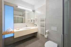Koupelna v ubytování Hotel Salona Palace