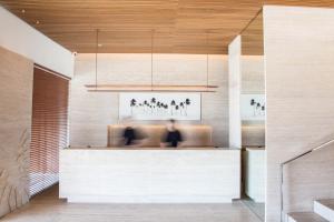Кровать или кровати в номере JANEIRO Hotel
