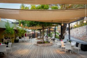 Zahrada ubytování C Hotel Neve Ilan