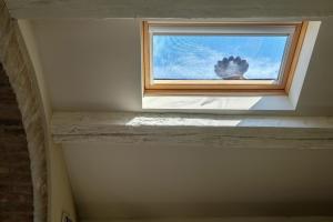 a window in a room with a sky at Attico Terrazza in Venice