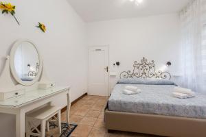 Posteľ alebo postele v izbe v ubytovaní Rampolina view by Impero House