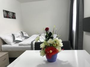 Posteľ alebo postele v izbe v ubytovaní Panorama Apartments