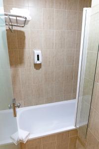 Koupelna v ubytování Hotel Alda Cardeña + 37 fotografií
