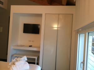TV a/nebo společenská místnost v ubytování 15.92 Hotel