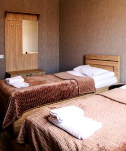 Ein Bett oder Betten in einem Zimmer der Unterkunft Tower