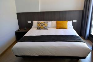 Cama o camas de una habitación en Hotel Alda Estación Ourense