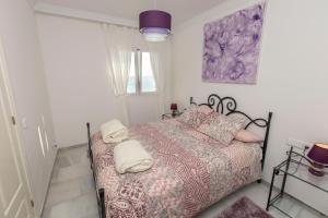 Posteľ alebo postele v izbe v ubytovaní Villa Venecia, Apartamento de Lujo en 1º línea de playa + parking