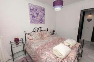 Posteľ alebo postele v izbe v ubytovaní Villa Venecia, Apartamento de Lujo en 1º línea de playa + parking