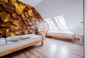 Postel nebo postele na pokoji v ubytování Aroma Gold