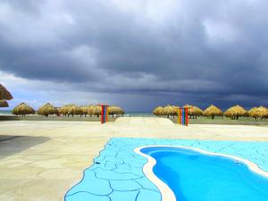 Bazén v ubytování Hotel Arena Beach Cartagena nebo v jeho okolí