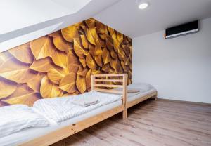 Postel nebo postele na pokoji v ubytování Aroma Gold