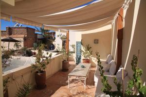 Area soggiorno di Riad Le Coq Berbère