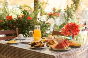 Opções de café da manhã disponíveis para hóspedes em Pousada Fortaleza
