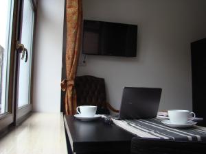 Televízia a/alebo spoločenská miestnosť v ubytovaní St. Dorothys hostel - apartments