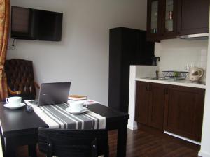 Kuchyňa alebo kuchynka v ubytovaní St. Dorothys hostel - apartments