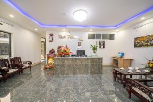 a waiting room at a dental clinic with a counter at Tran Family Villas Boutique Hotel in Hoi An