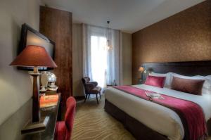 Postel nebo postele na pokoji v ubytování Best Western Plus Nice Cosy Hotel