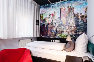 Ένα ή περισσότερα κρεβάτια σε δωμάτιο στο Best Western Hotel Nürnberg am Hauptbahnhof